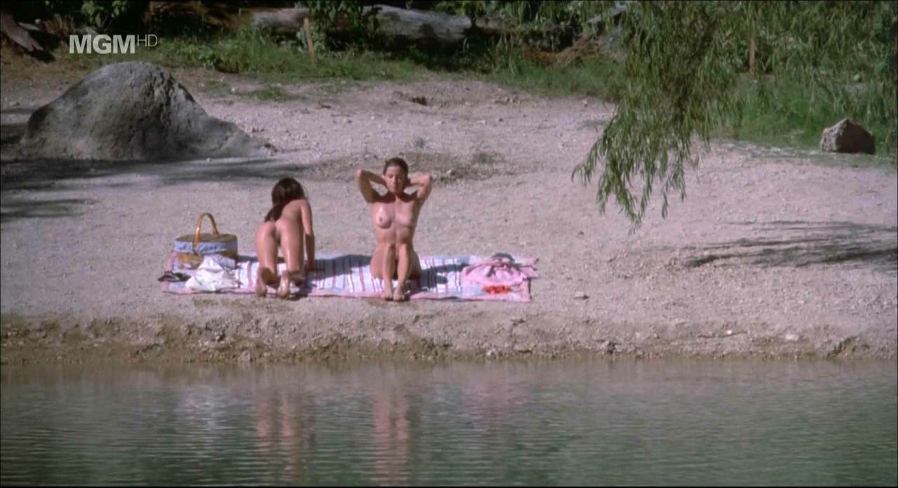 Jennifer Connelly showing her nice boobs and pussy from behind on beach in movie #75309233