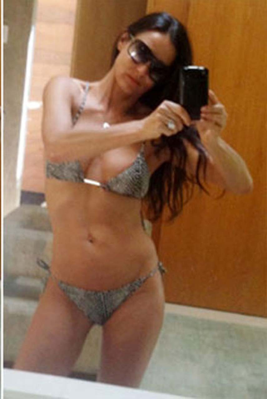 Demi Moore leggy in mini skirt and posing in lingerie and exposing her huge boob #75324651