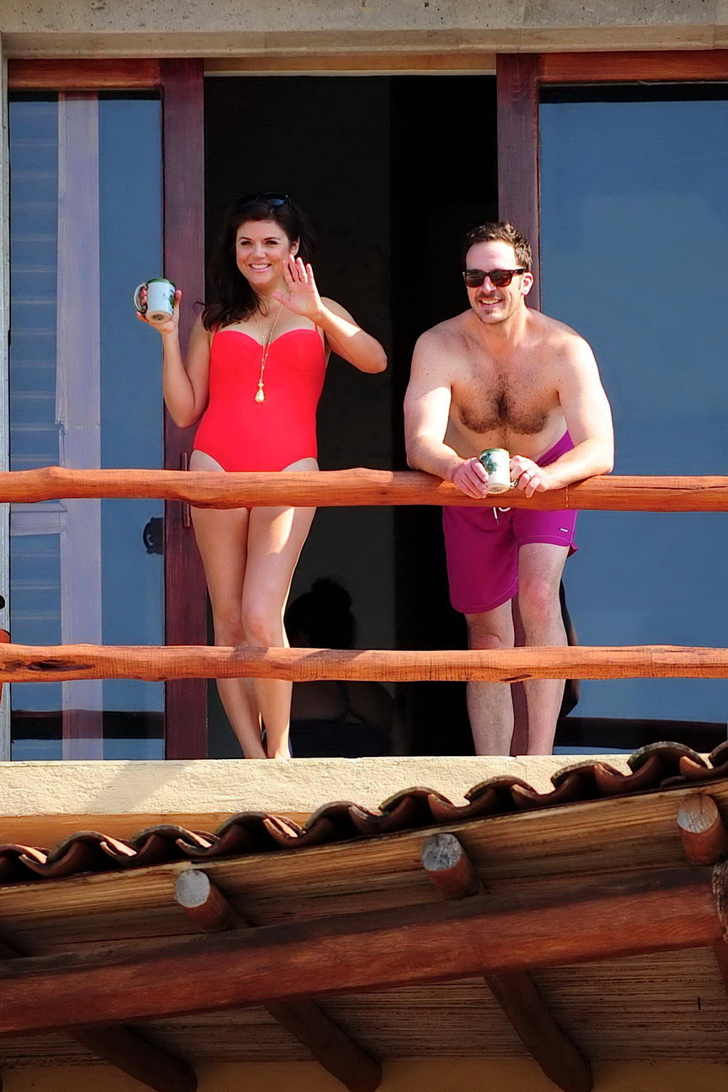 Busty Tiffani Amber Thiessen wearing a red swimsuit on a beach in Mexico #75205703