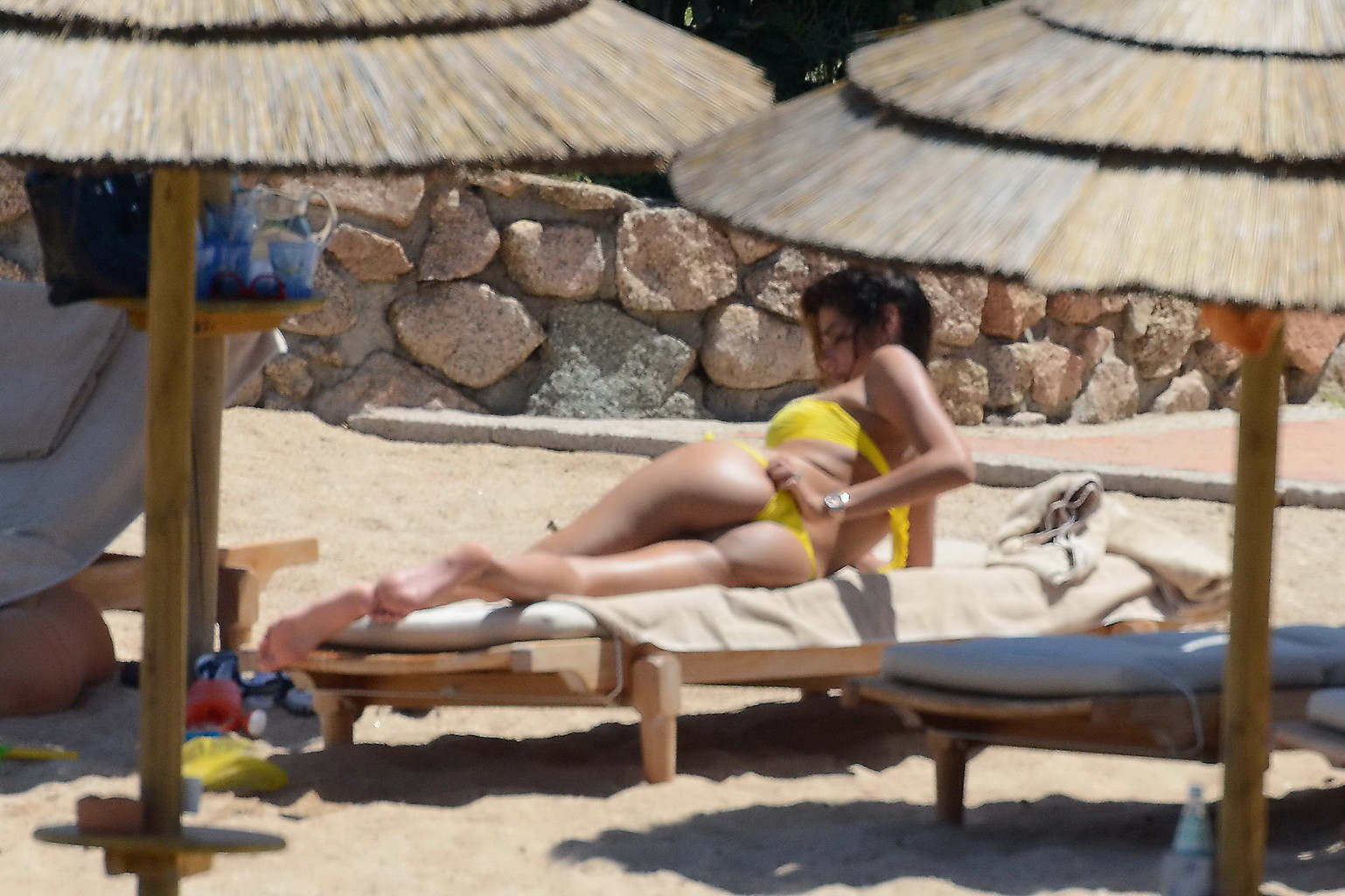 Aida Yespica showing off her ass wearing a yellow thong bikini in Sardinia #75259344
