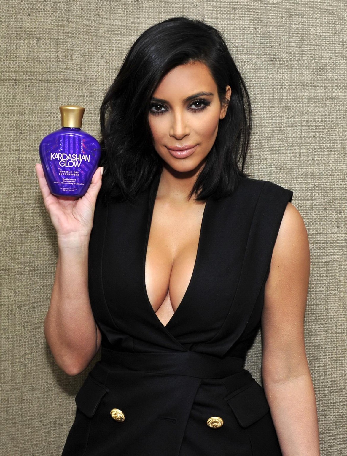 Kim Kardashian leggy  cleavy at the  Exclusive Meet and Greet for Kardashian Glo #75170512