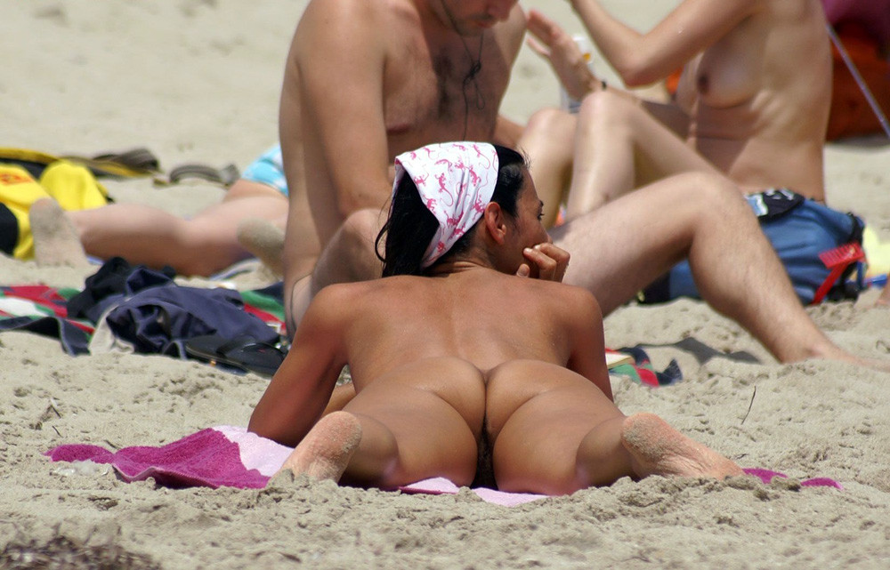 Hot Russian nudist strips her bikini off here #72244380