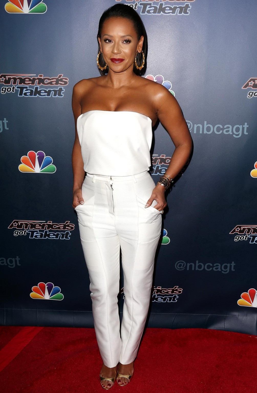 Melanie Brown busty wearing a strapless top at the Americas Got Talent season 9  #75185479
