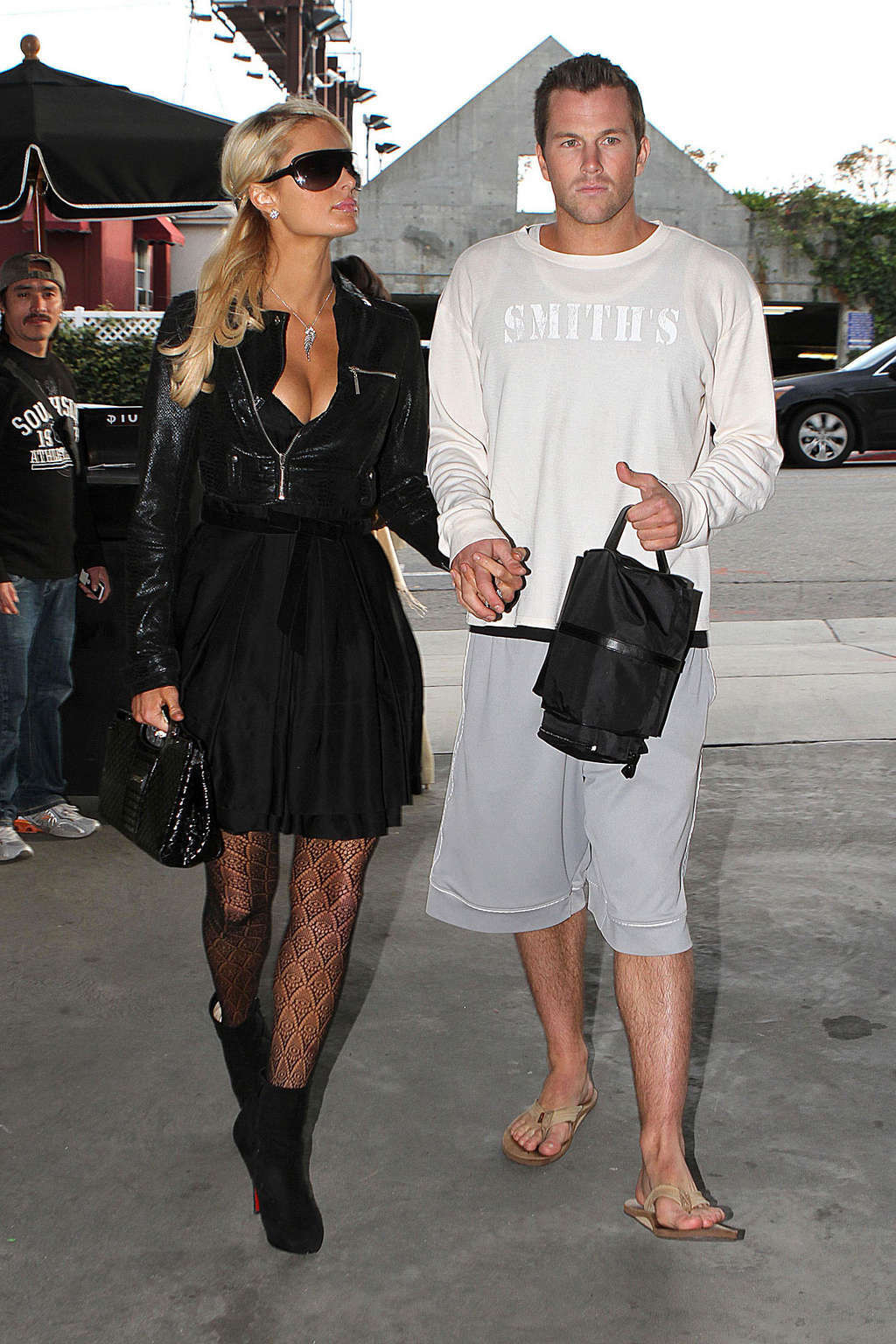 Paris Hilton in stockings and dress on street paparazzi shoots #75357782