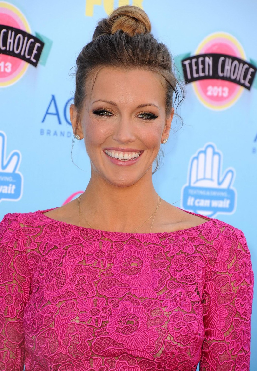 Katie Cassidy wearing a tight pink mini dress at the 2013 Teen Choice Awards in  #75222126