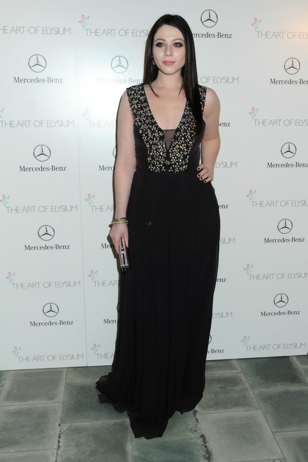 Michelle Trachtenberg braless showing big cleavage at 2014 Art of Elysium 7th An #75207557