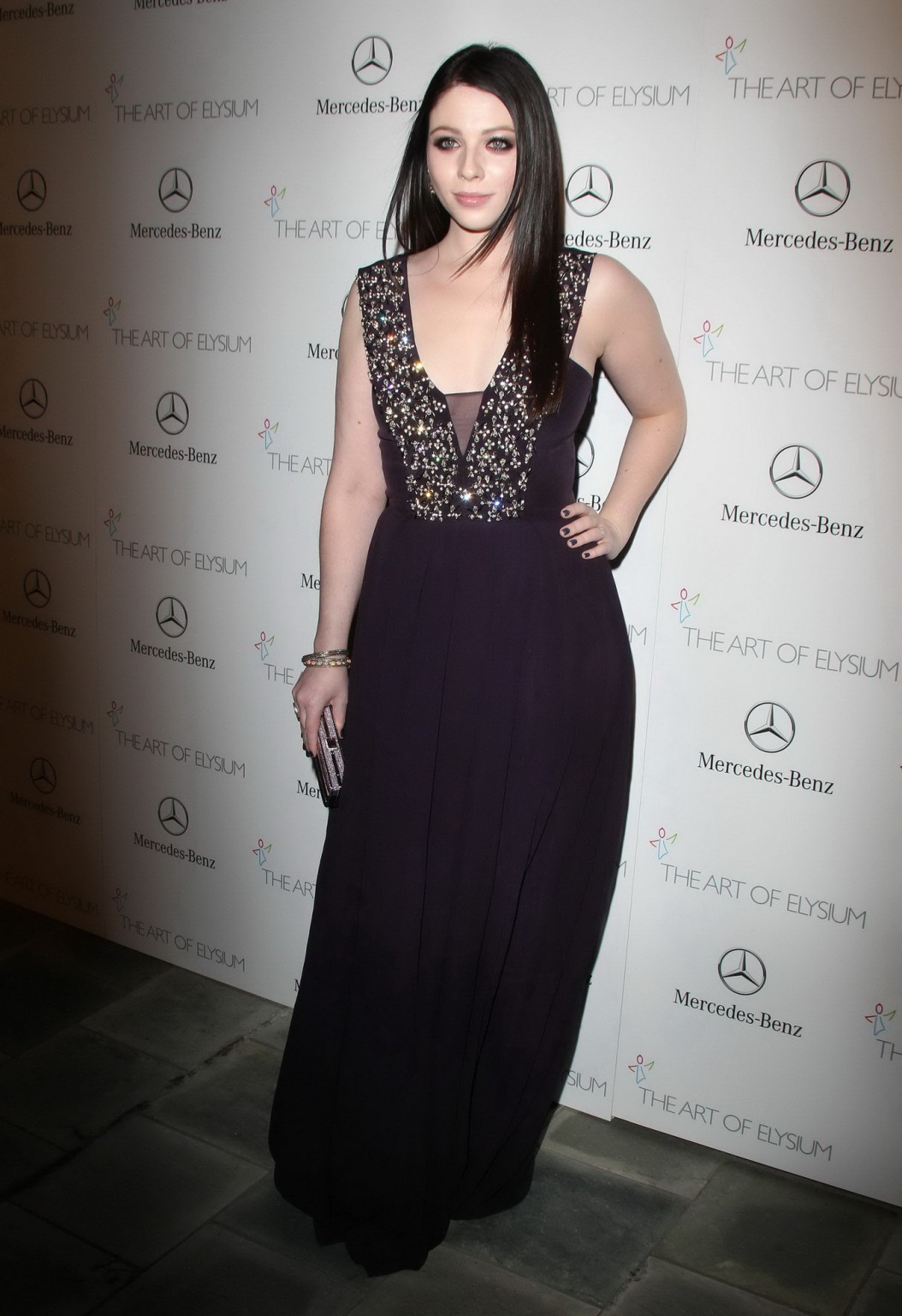 Michelle Trachtenberg braless showing big cleavage at 2014 Art of Elysium 7th An #75207598