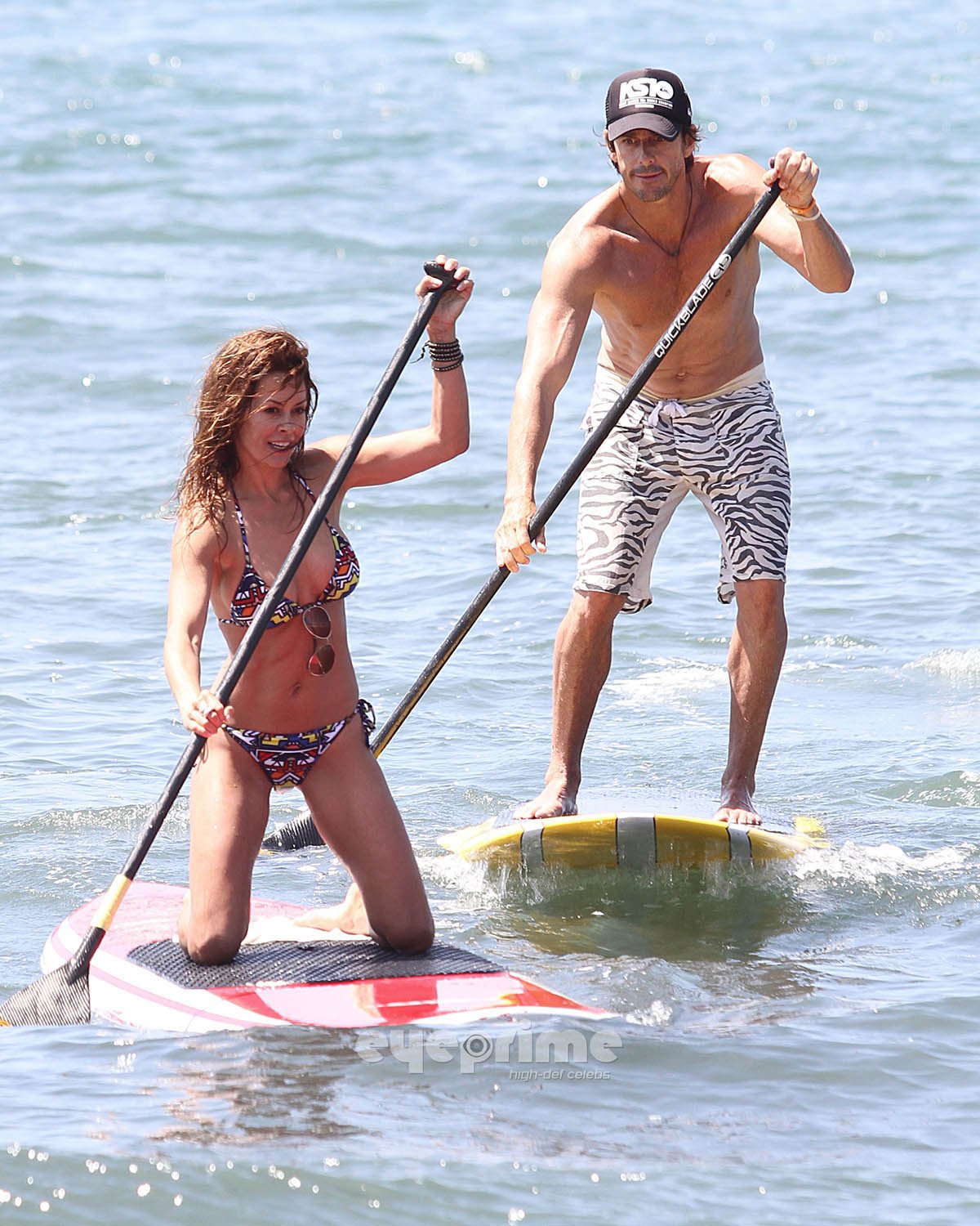 Brooke Burke paddle surfing in bikini on the Malibu Beach #75293453