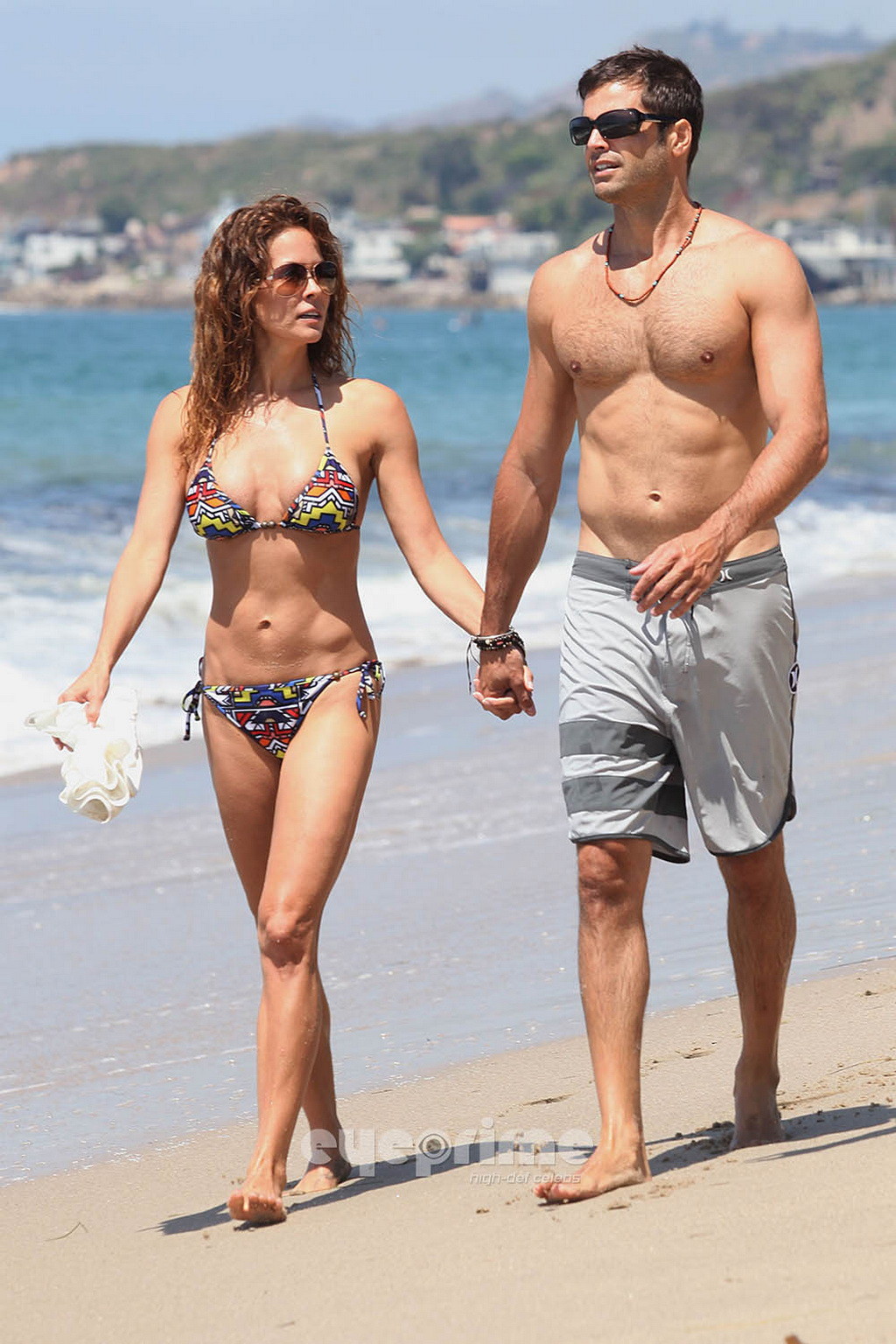 Brooke Burke paddle surfing in bikini on the Malibu Beach #75293530