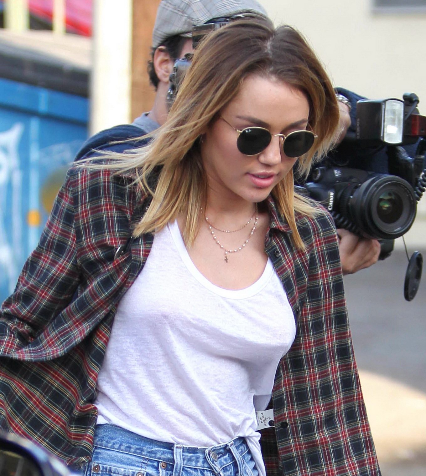 Miley Cyrus braless showing pokies outside Wokcano Restaurant in LA #75275521