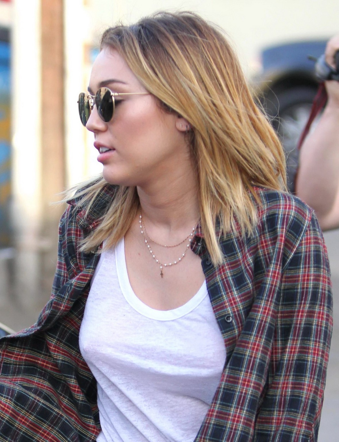 Miley cyrus braless showing pokies outside wokcano restaurant in la
 #75275593