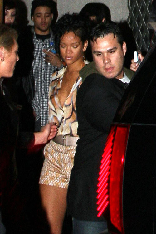 Rihanna showing her nice tits in see thru top and great legs in mini skirt #75401981