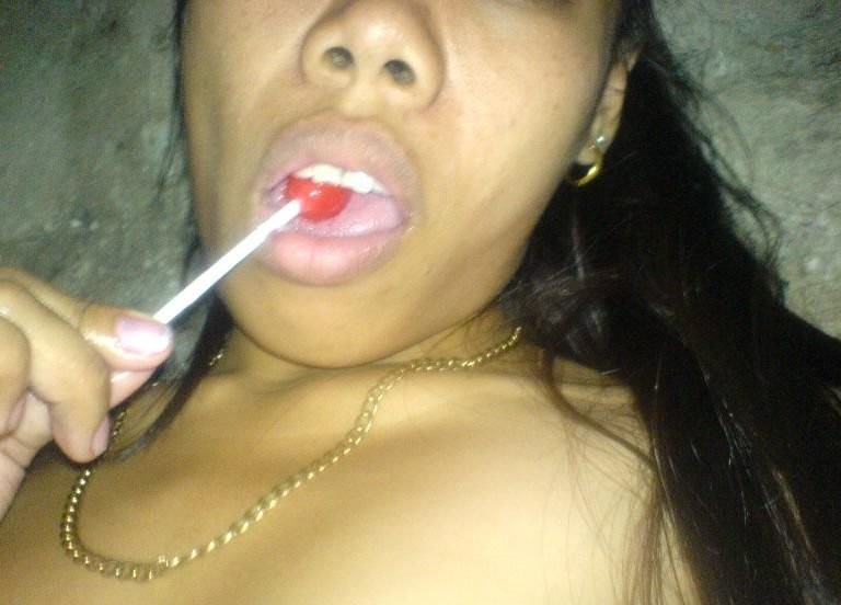 Asian slut posing and sticking lollipop up her poontang #75788000