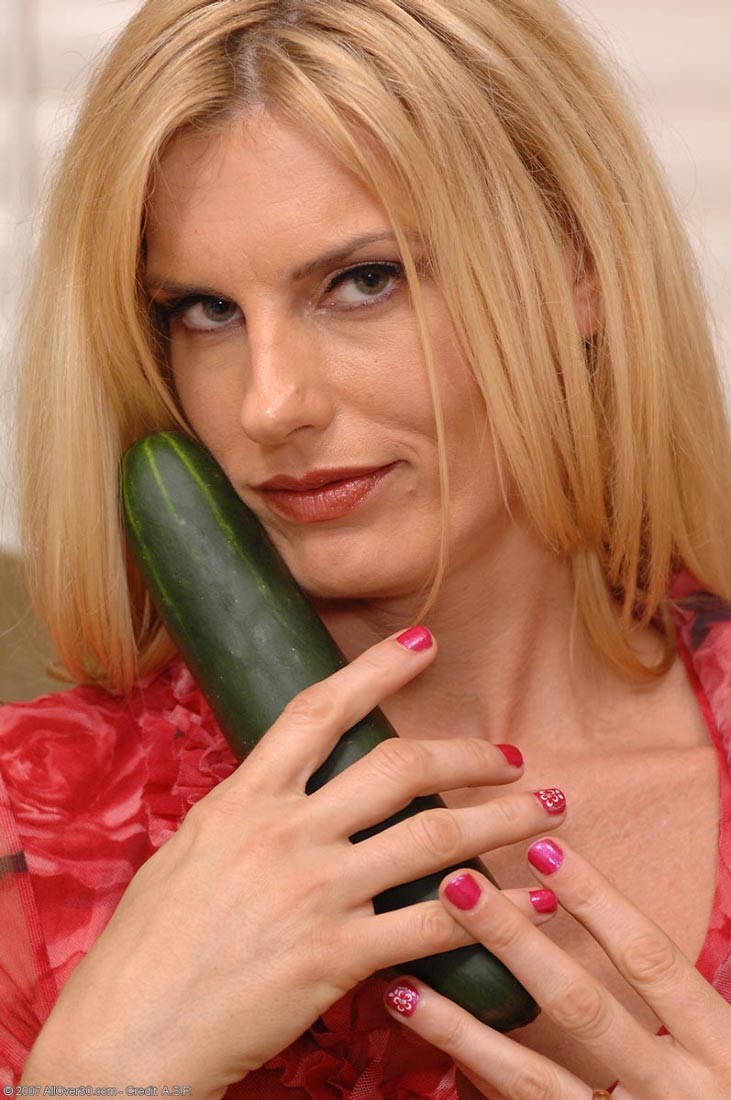 Horny blonde milf fucks huge cucumber in fishnet pantyhose #70526854