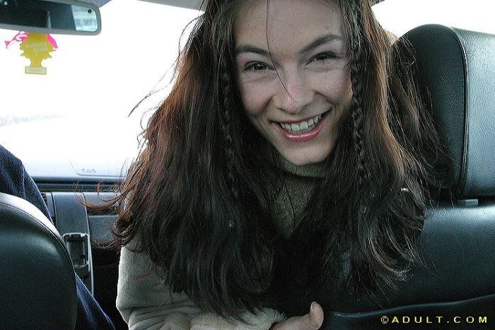 teen hitchhiker flashes her perfect smile #74994430