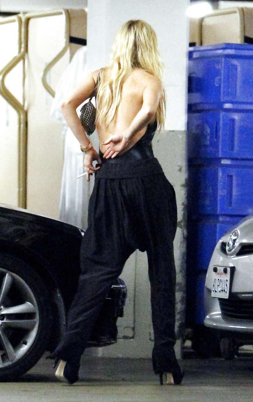 Lindsay Lohan flashing her panties upskirt on street paparazzi pictures #75256273