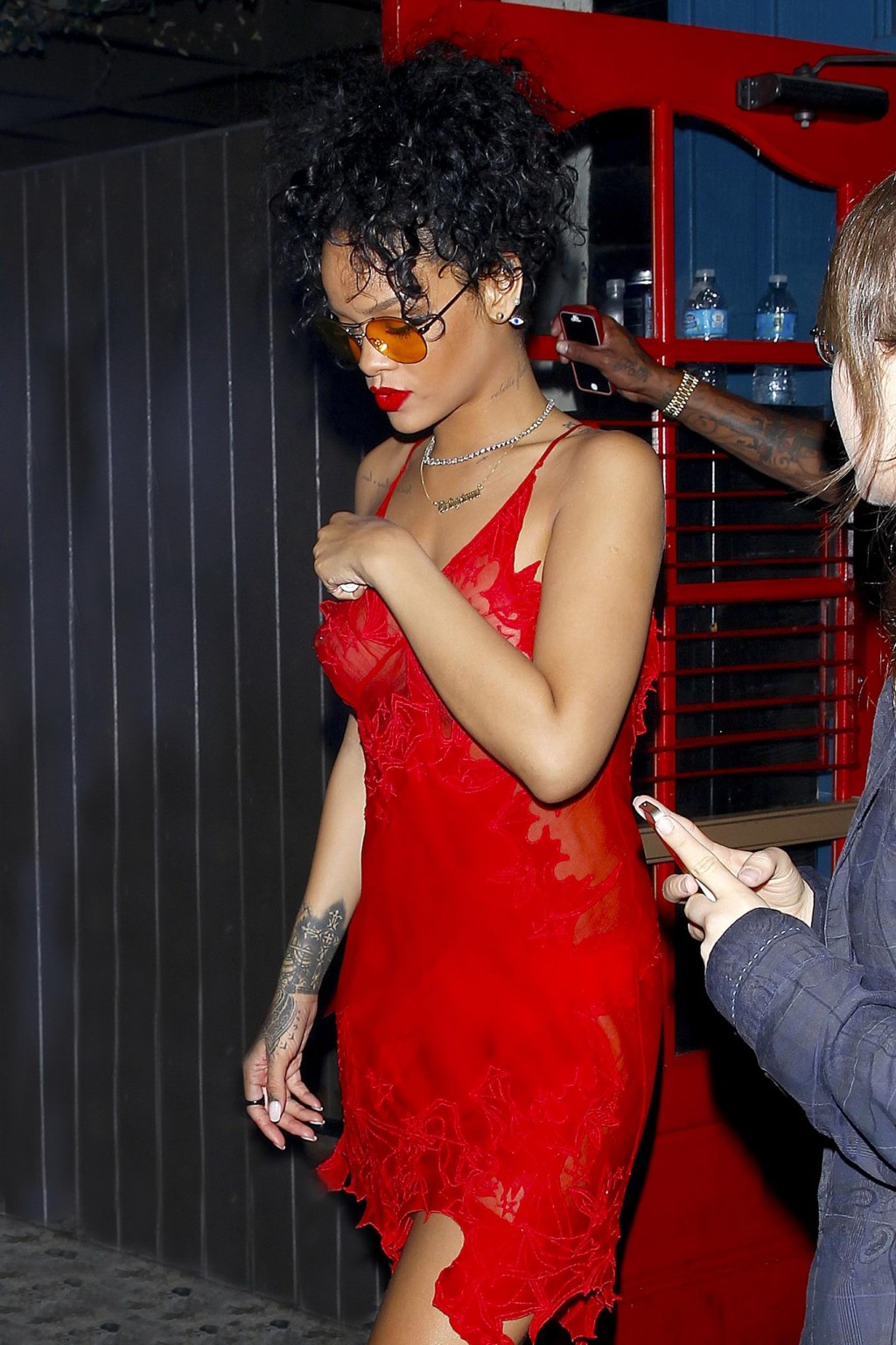 Rihanna shows off her boobs wearing a red see through dress at Hooray Henrys in  #75191804