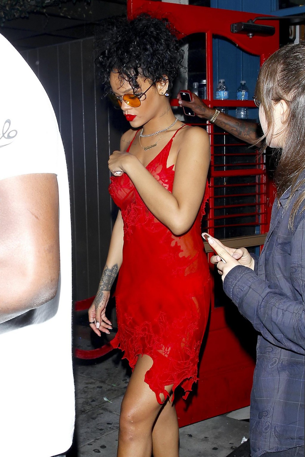 Rihanna shows off her boobs wearing a red see through dress at Hooray Henrys in  #75191812