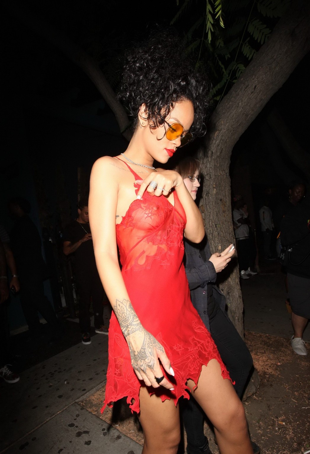 Rihanna shows off her boobs wearing a red see through dress at Hooray Henrys in  #75191841