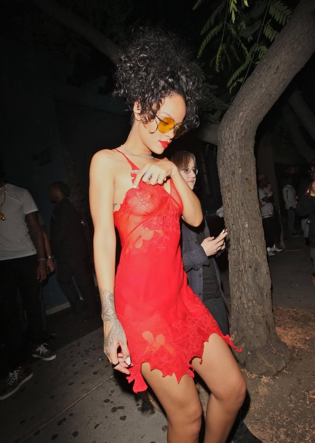Rihanna shows off her boobs wearing a red see through dress at Hooray Henrys in  #75191850