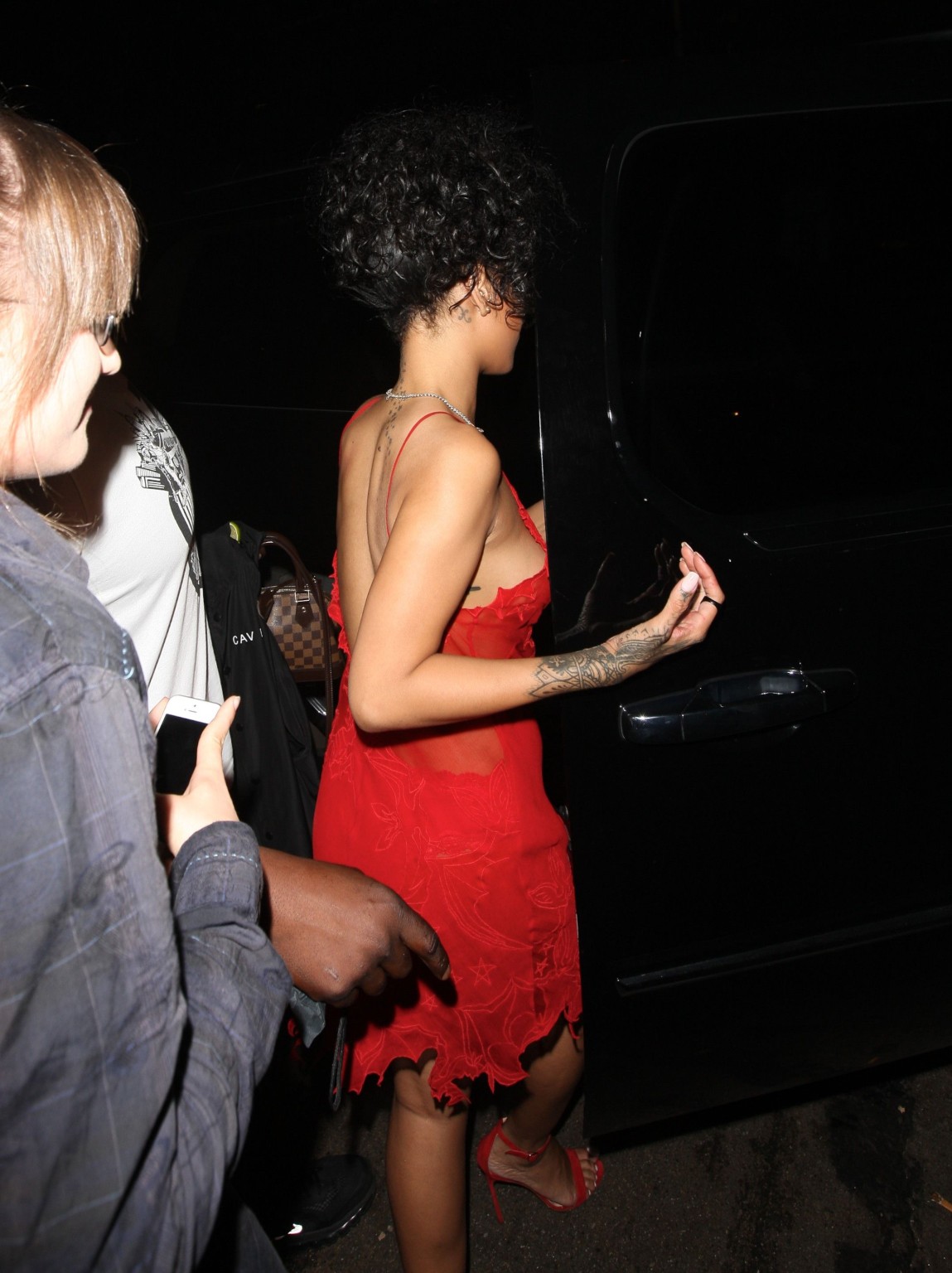 Rihanna shows off her boobs wearing a red see through dress at Hooray Henrys in  #75191910