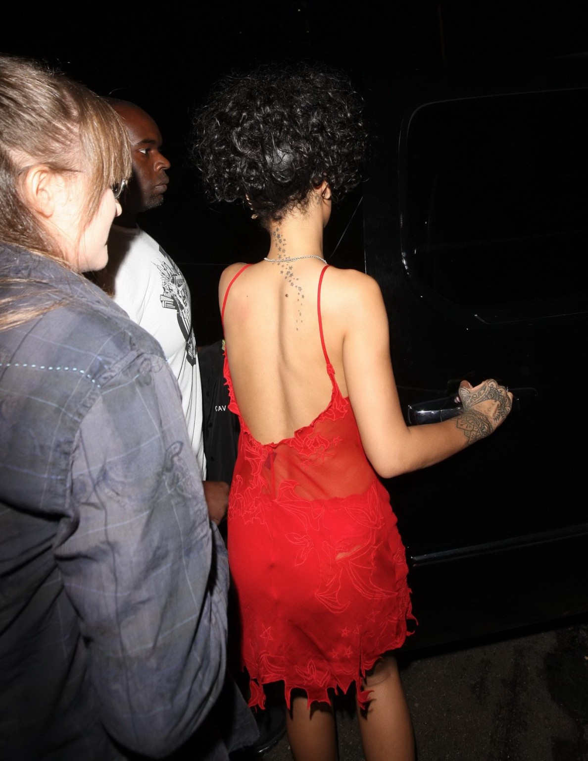 Rihanna shows off her boobs wearing a red see through dress at Hooray Henrys in  #75191914