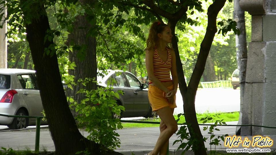 Sunny orange shorts of a babe get totally pee-drenched in the street #73243837