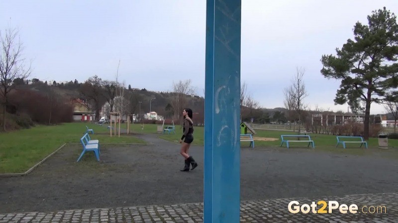 Naughty dark haired babe pees in a public park #67486471