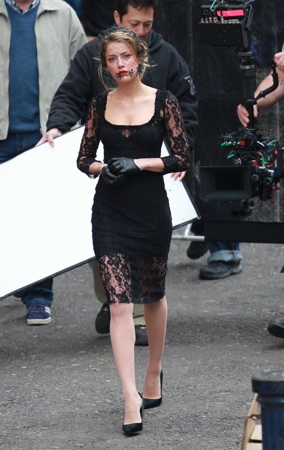 Amber Heard busty wearing a black lace dress on the set of 'London Fields' in Lo #75218389