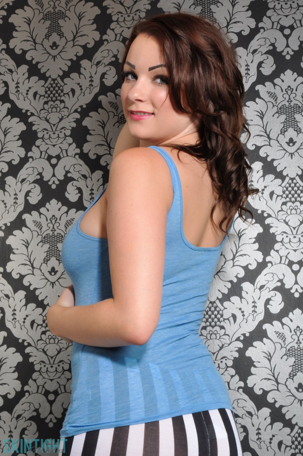 Beauty brunette Penny in her stripe leggings and blue top #72352029