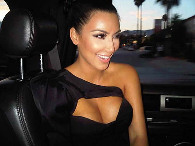 Kim Kardashian exposing huge boobs in bikini top on private photos #75274901