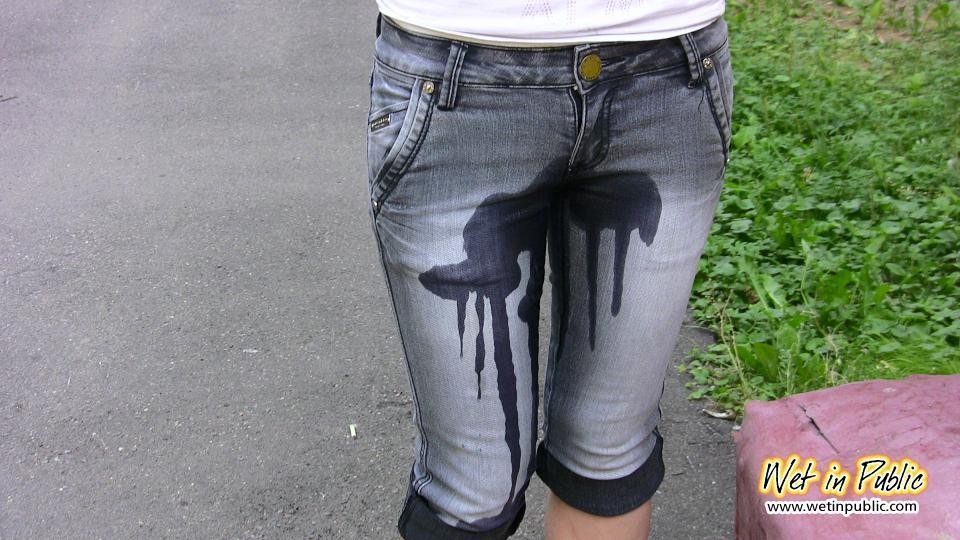 Chick in desperate pissing need wets her jeans, feet and the asphalt #73239088