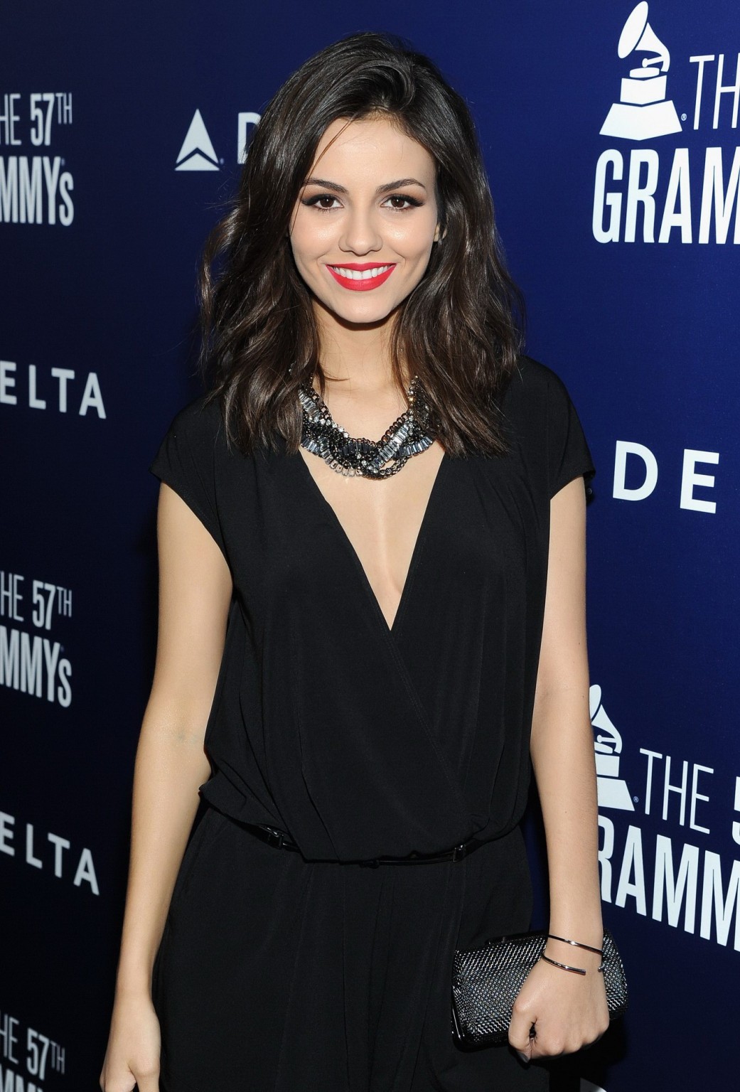 Victoria Justice showing big cleavage in black mini dress at Delta Air Lines GRA #75173570