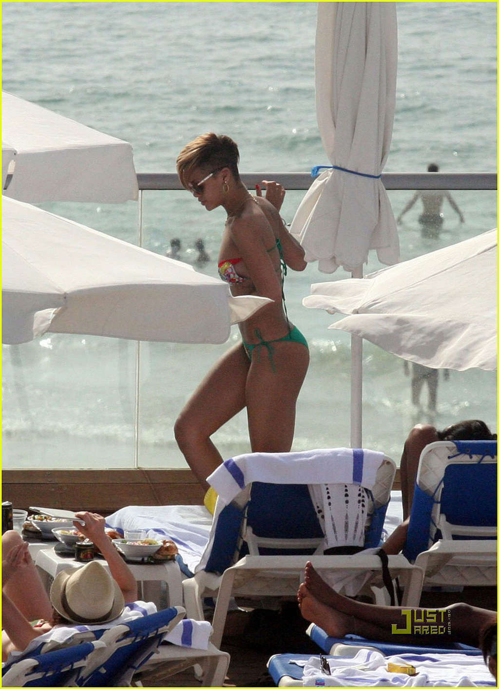 Rihanna looking sexy in bikini on pool paparazzi shoots #75347708