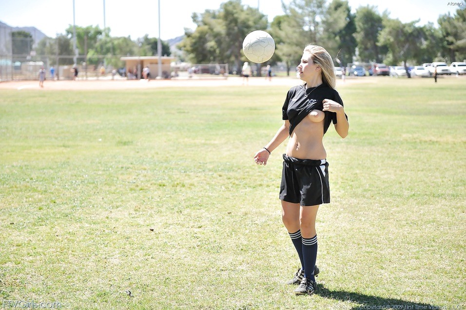 Blondie in soccer player strips outside #78616447