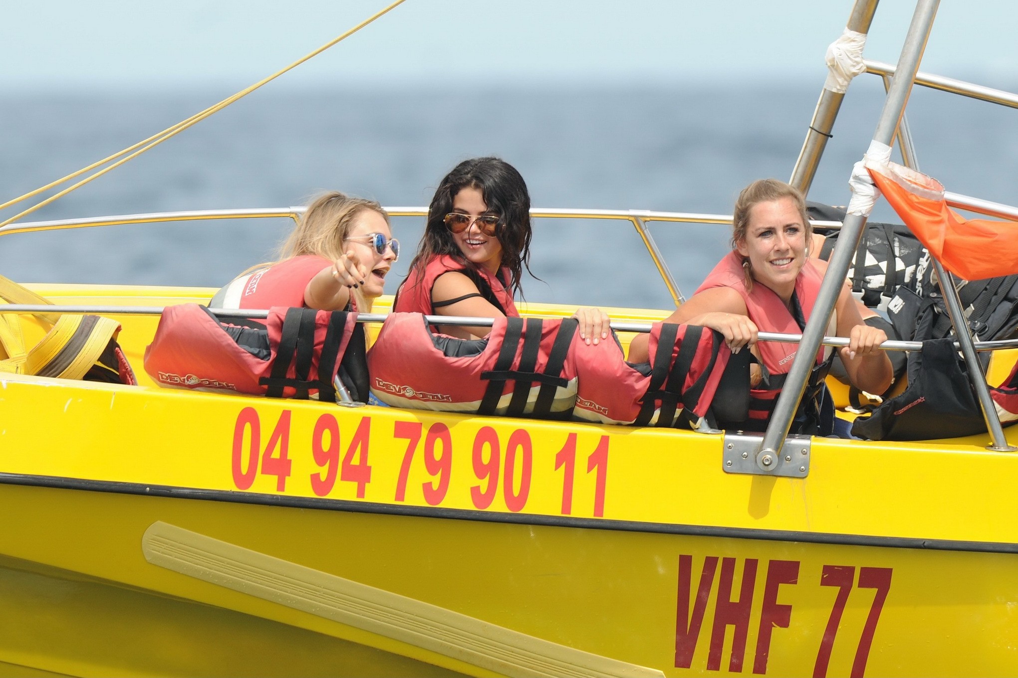 Selena Gomez and Cara Delevingne wearing skimpy black bikinis at a yacht in Sain #75189574