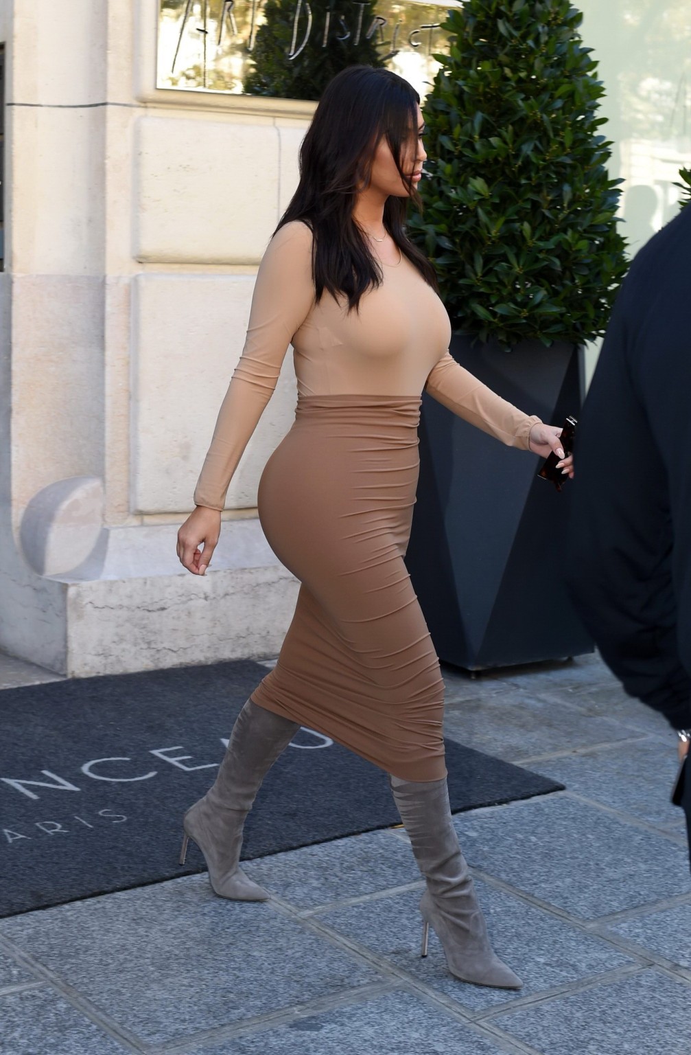 Kim Kardashian shows off her curvy body wearing tight top and skirt outside Le R #75184940