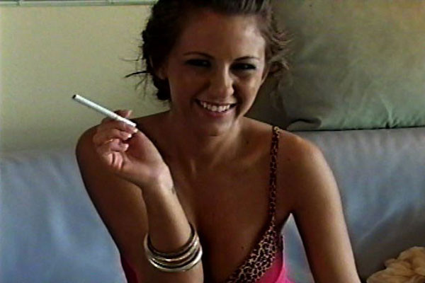 A heavenly honey shows off her goodies while taking long drags of nicotine. #68254610