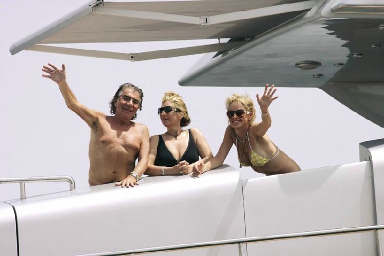 Sharon Stone topless in a bikini at the beach in these pics #75380736
