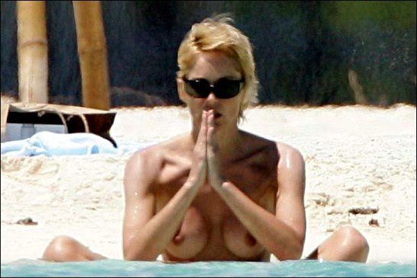 Sharon Stone topless in a bikini at the beach in these pics #75380748