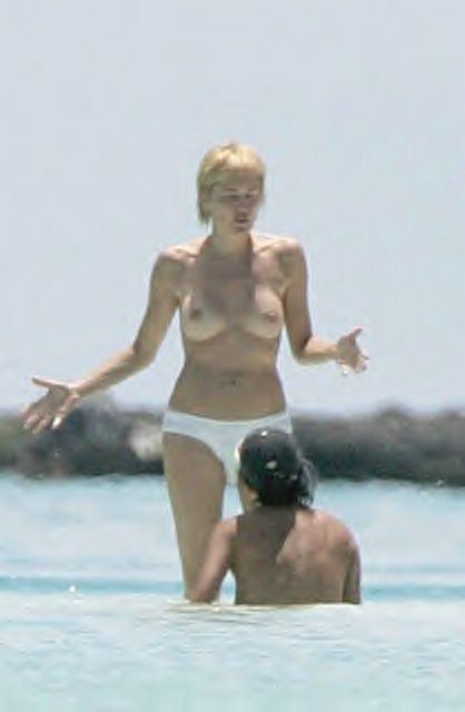 Sharon Stone topless in a bikini at the beach in these pics #75380761