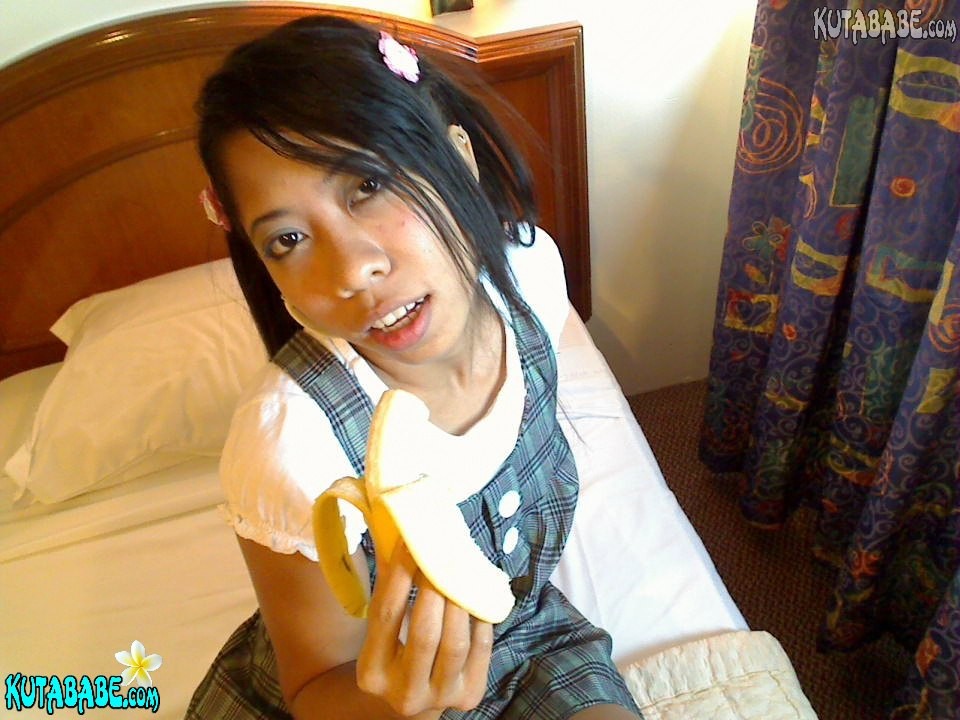 Asian Bali teen girl blows banana #67444554