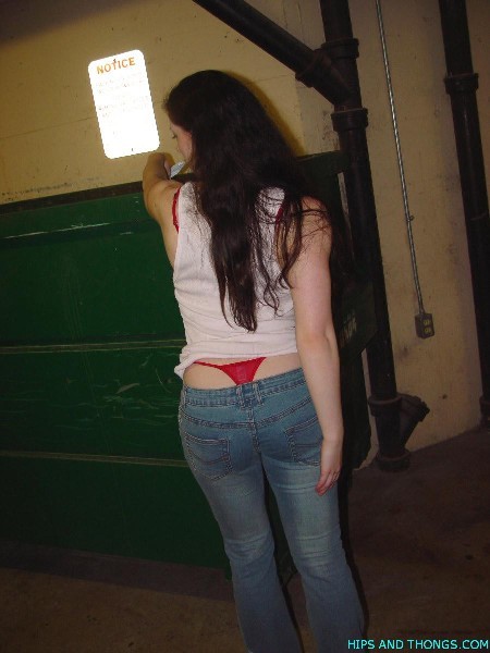 Hip hugger jeans and red thongs #76665924
