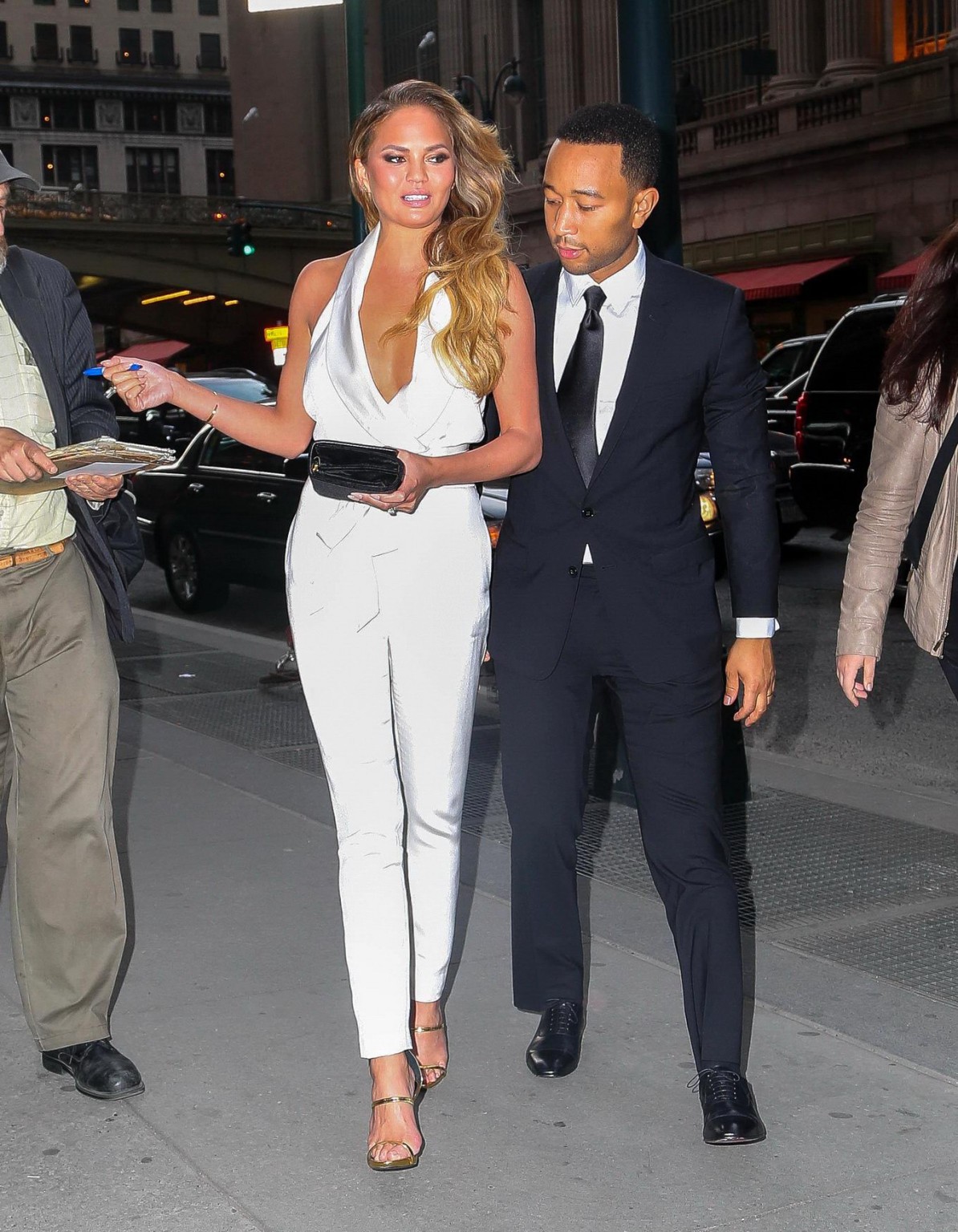 Chrissy Teigen busty  braless wearing a wide open jumpsuit at City Harvests 21st #75165049