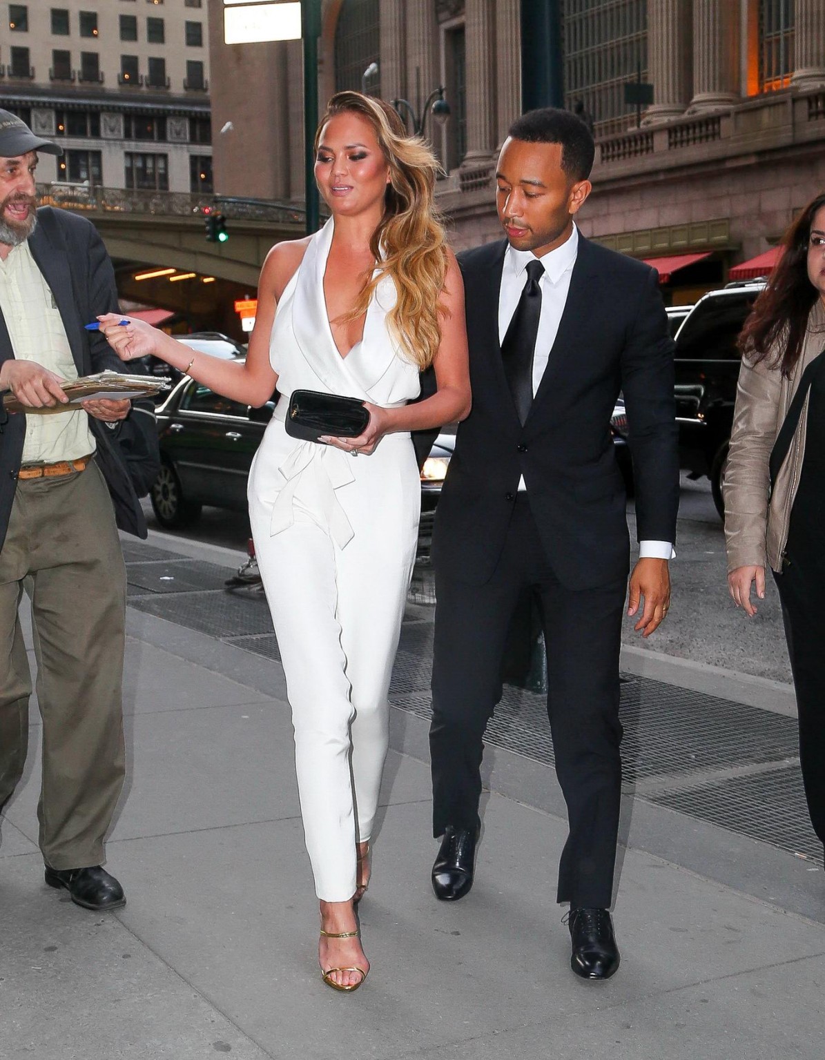 Chrissy Teigen busty  braless wearing a wide open jumpsuit at City Harvests 21st #75165062