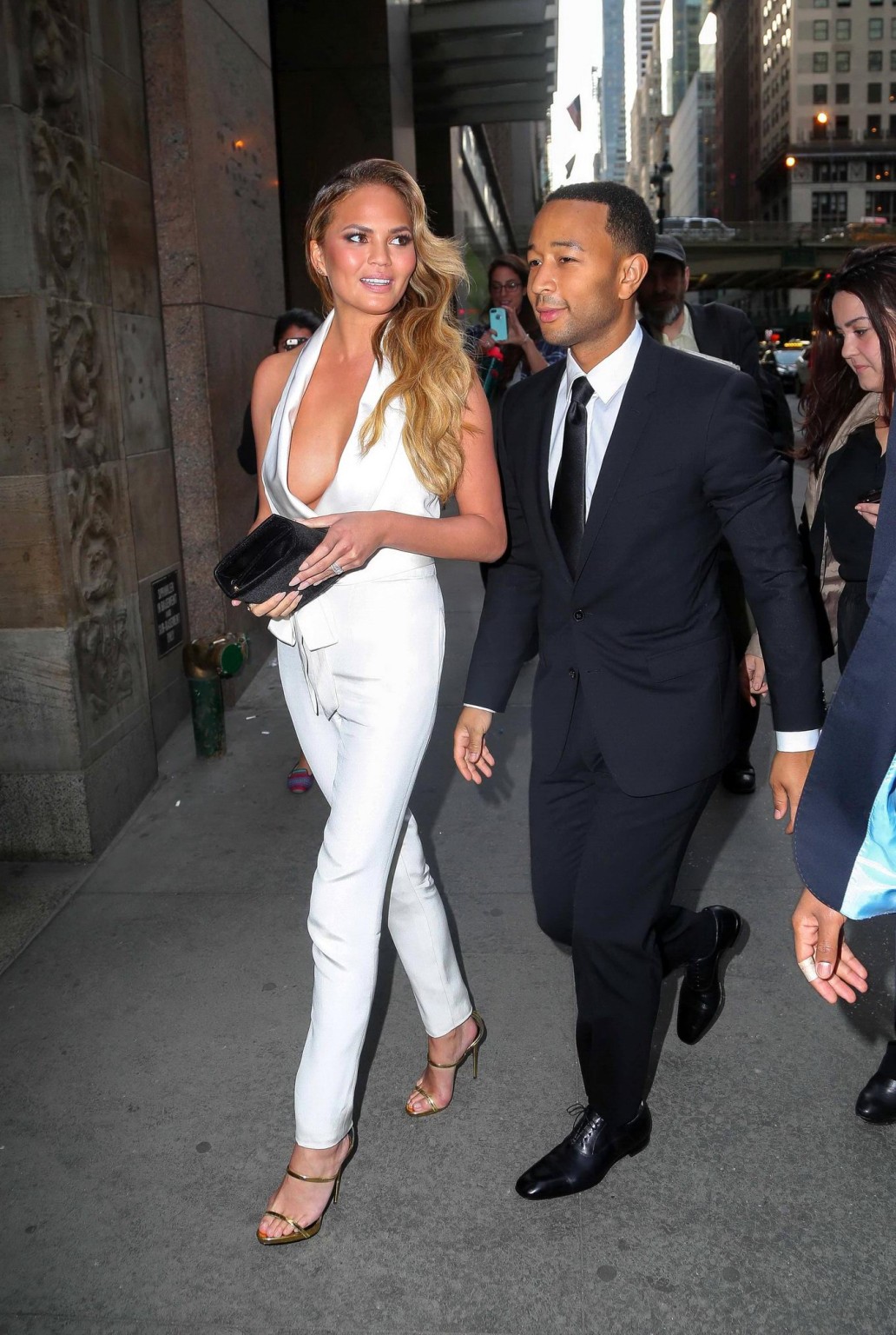 Chrissy Teigen busty  braless wearing a wide open jumpsuit at City Harvests 21st #75165115