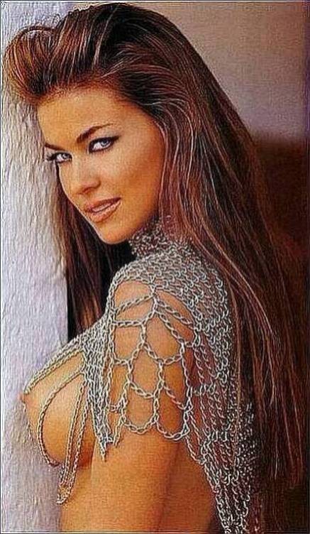 busty latin actress and model Carmen Electra gets naked