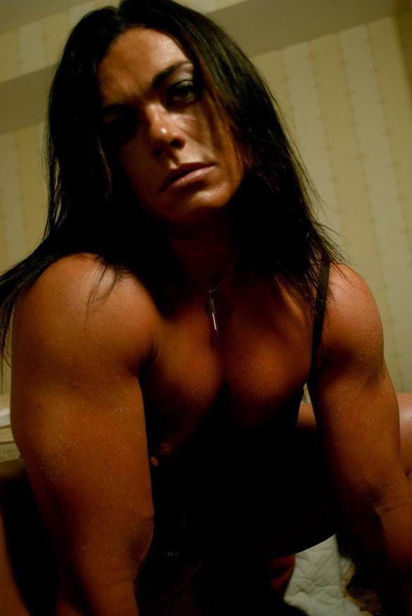 hot female bodybuilder shows off her muscles #76491844