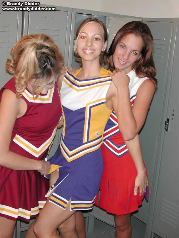 Three cheerleaders undress each other #75473686