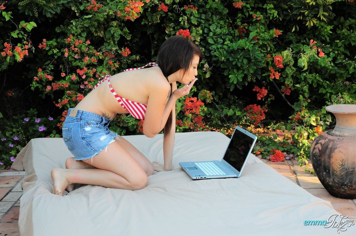 Flexible tattoed teen teasing her tits and pussy for her fans